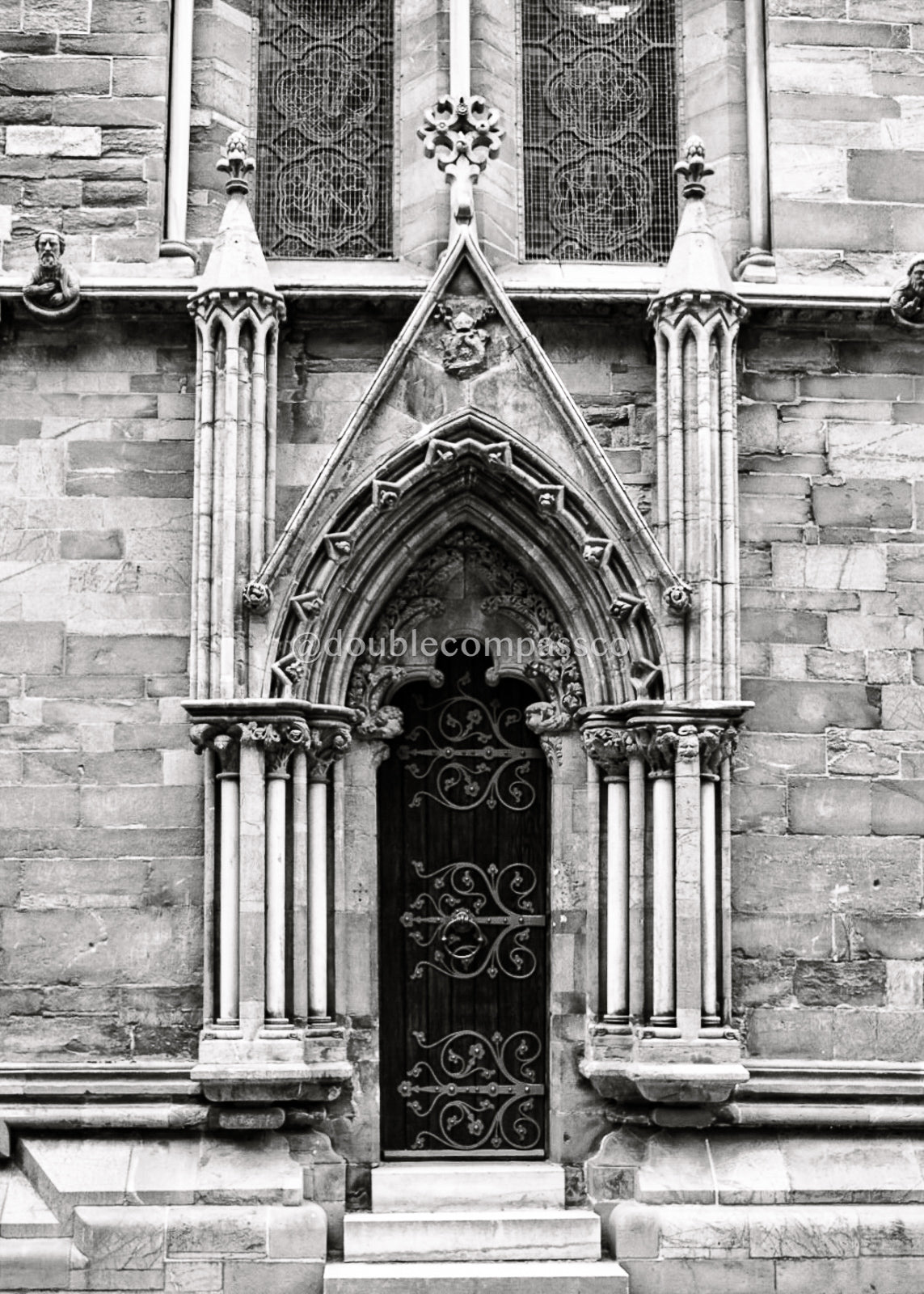 Black and white photograph of a church door in Norway